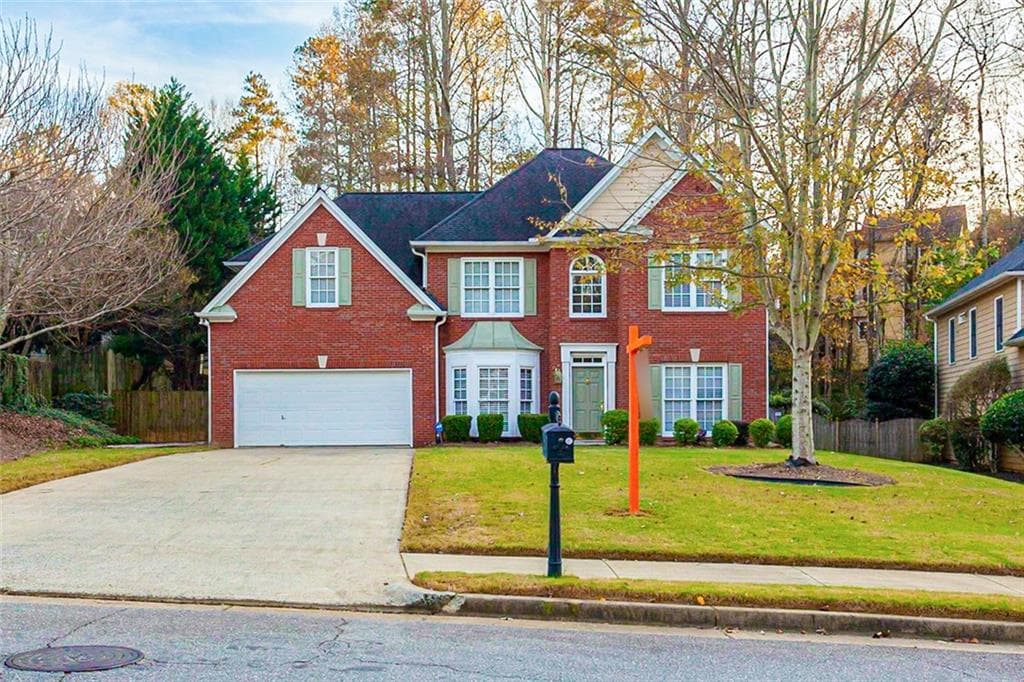 5 bedroom, 4 bathroom, 3,109 sq ft single family residence sold at 5030 ASHURST Drive, Roswell, GA 30075