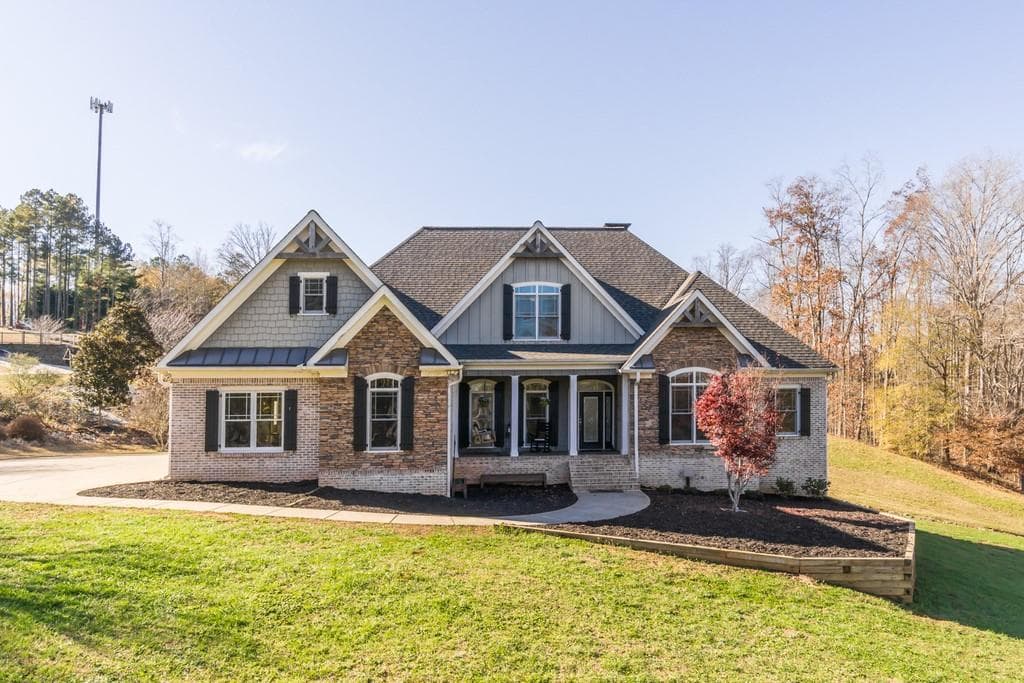 6 bedroom, 4 bathroom, 8,166 sq ft single family residence sold at 5767 Vaughn Road, Canton, GA 30115