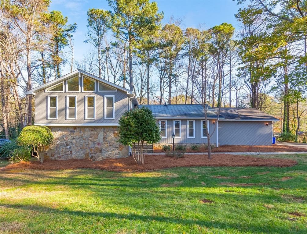 5 bedroom, 4 bathroom, 3,703 sq ft single family residence sold at 1190 Saint Andrews Circle, Atlanta, GA 30338