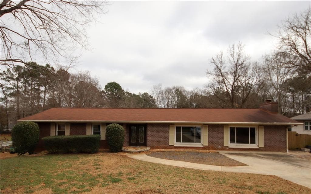 4 bedroom, 3 bathroom, 3,960 sq ft single family residence sold at 310 Crossville Court, Roswell, GA 30076