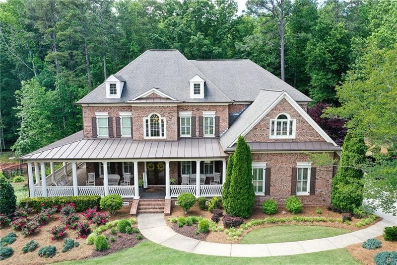 7 bedroom, 6 bathroom, 6,949 sq ft single family residence sold at 402 Monarch Lake Drive, Canton, GA 30115