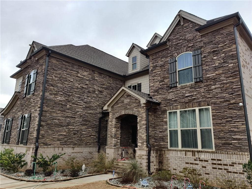 8 bedroom, 8 bathroom, 6,136 sq ft single family residence sold at 4226 Heisenberg Lane, Buford, GA 30024