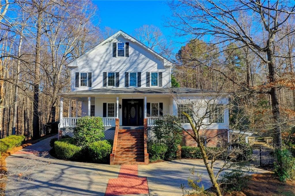 6 bedroom, 5 bathroom, 6,850 sq ft single family residence sold at 9050 Scuppernong Lane, Cumming, GA 30041
