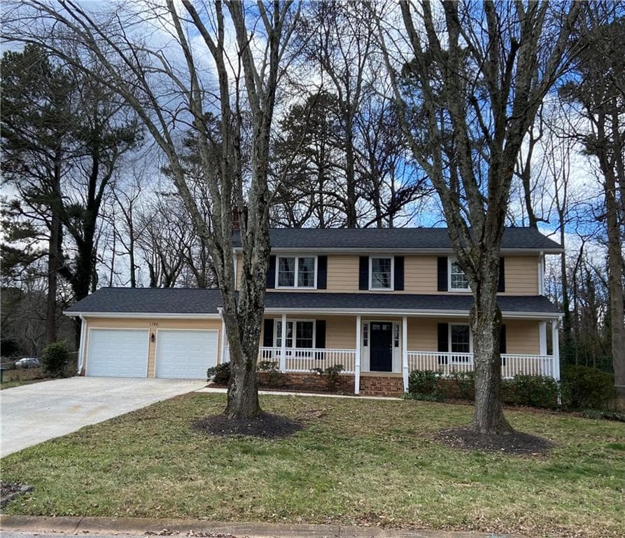 4 bedroom, 3 bathroom, 2,172 sq ft single family residence sold at 1196 Spring Mill Drive, Lilburn, GA 30047