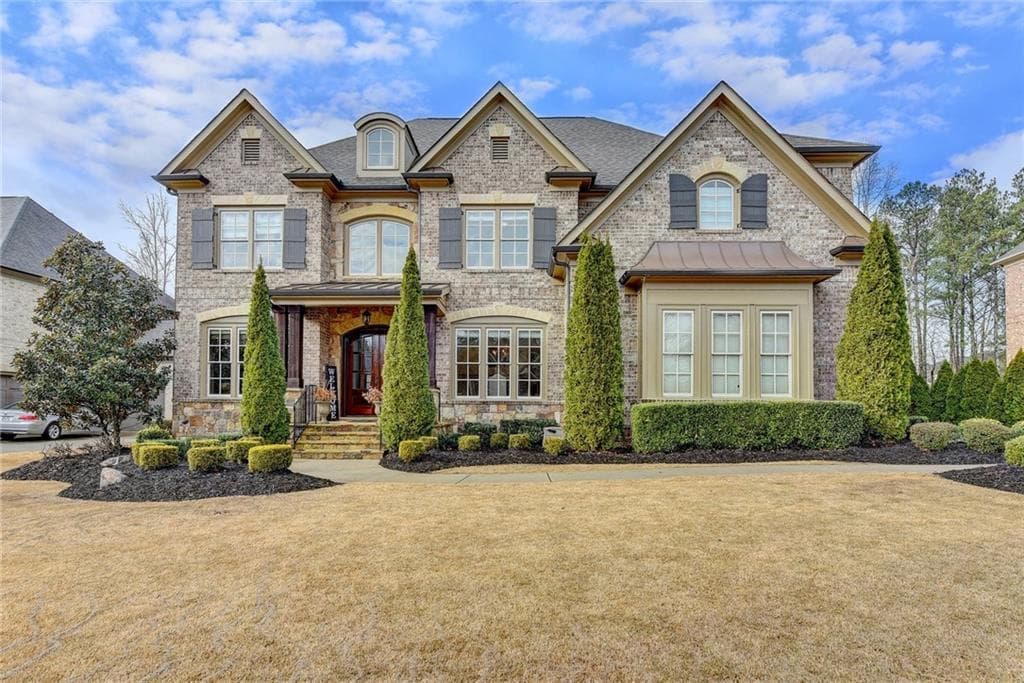 6 bedroom, 7 bathroom, 6,974 sq ft single family residence sold at 2610 Manor Creek Court, Cumming, GA 30041