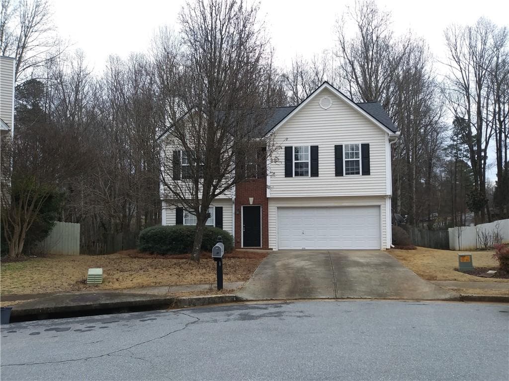 4 bedroom, 3 bathroom, 1,872 sq ft single family residence sold at 318 Lee Miller Drive, Suwanee, GA 30024
