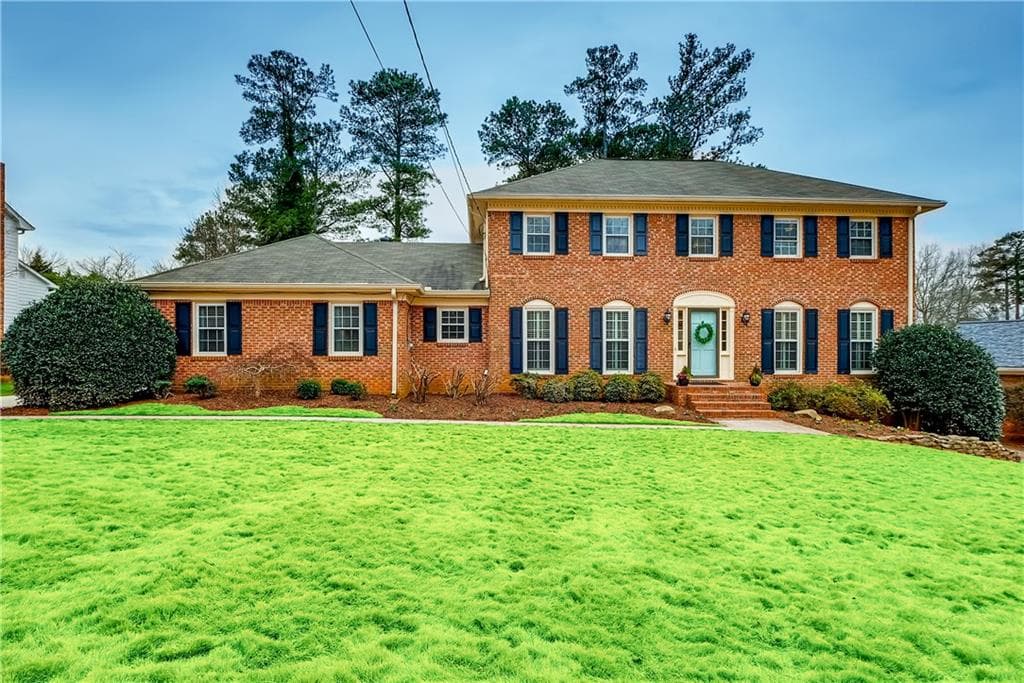 5 bedroom, 4 bathroom, 3,704 sq ft single family residence sold at 5299 Wynterhall Drive, Atlanta, GA 30338