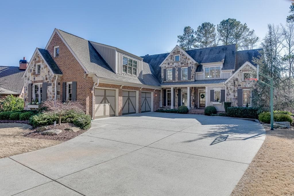 6 bedroom, 6 bathroom, 6,470 sq ft single family residence sold at 906 Basingstoke Court, Suwanee, GA 30024