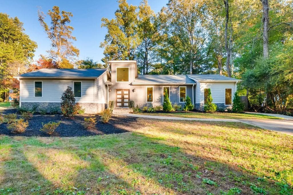5 bedroom, 4 bathroom, 4,294 sq ft single family residence sold at 6445 Long Island Drive, Atlanta, GA 30328