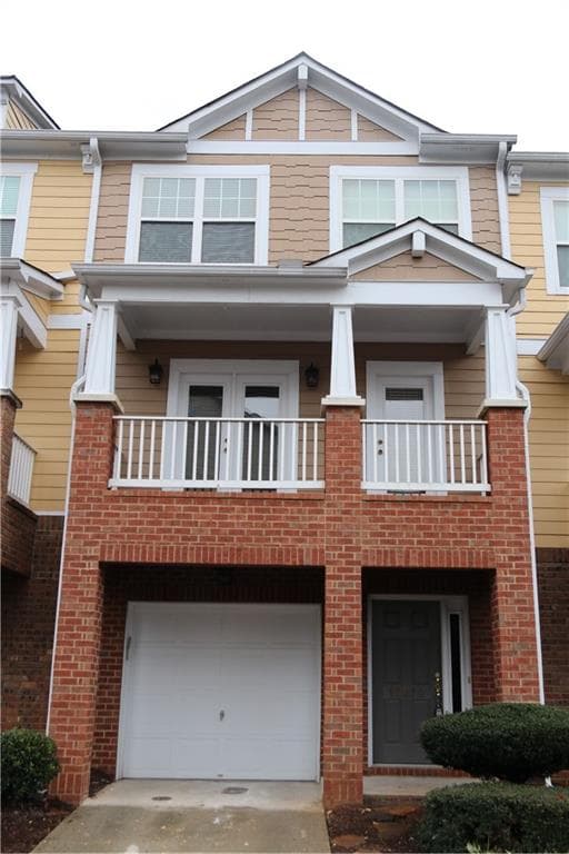 3 bedroom, 4 bathroom, 1,520 sq ft townhouse sold at 14074 Voyage Trail, Alpharetta, GA 30004