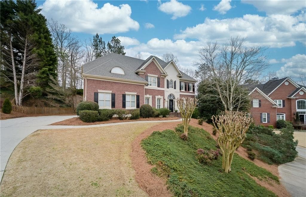 6 bedroom, 5 bathroom, 5,097 sq ft single family residence sold at 310 Old Sandhurst Station, Alpharetta, GA 30022