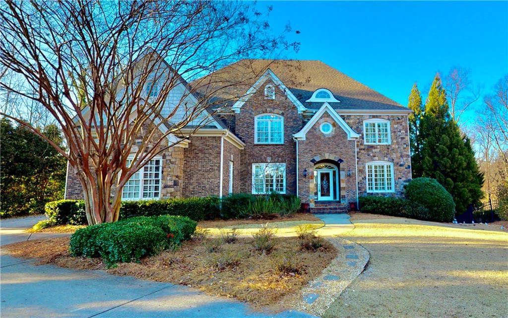 6 bedroom, 6 bathroom, 5,688 sq ft single family residence sold at 5240 Forest Ridge Circle, Atlanta, GA 30342 — photo 1 of 1