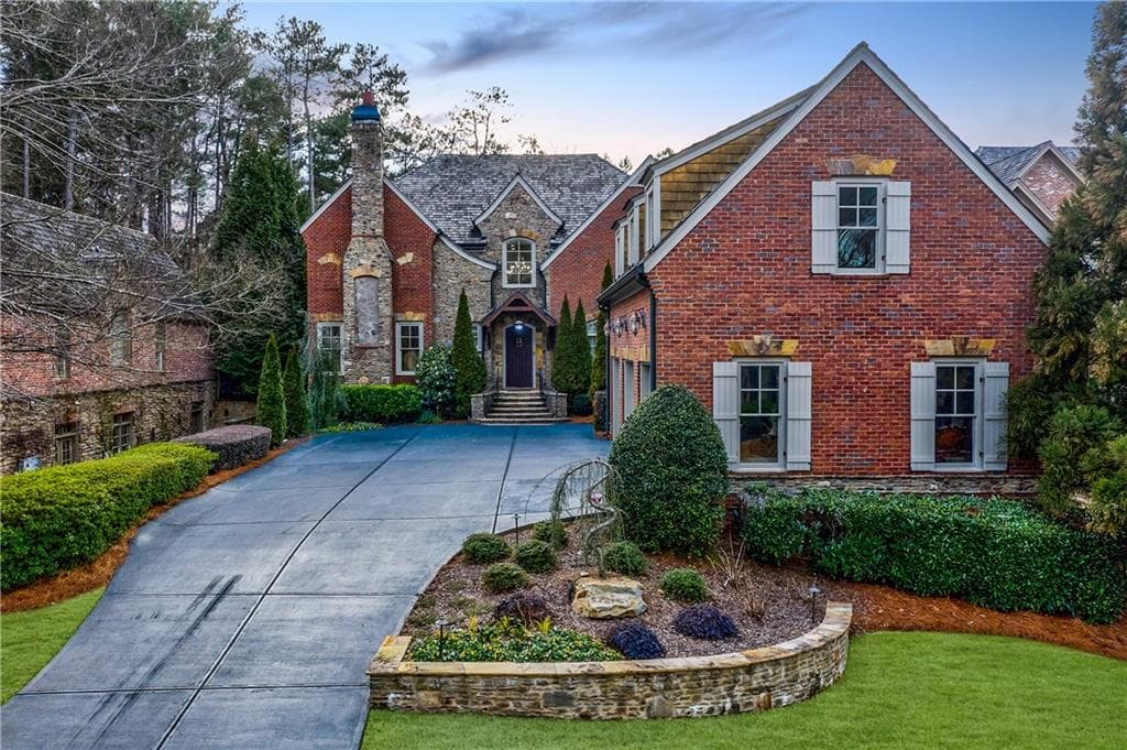 7 bedroom, 8 bathroom, 6,106 sq ft single family residence sold at 130 Ardsley Lane, Alpharetta, GA 30005