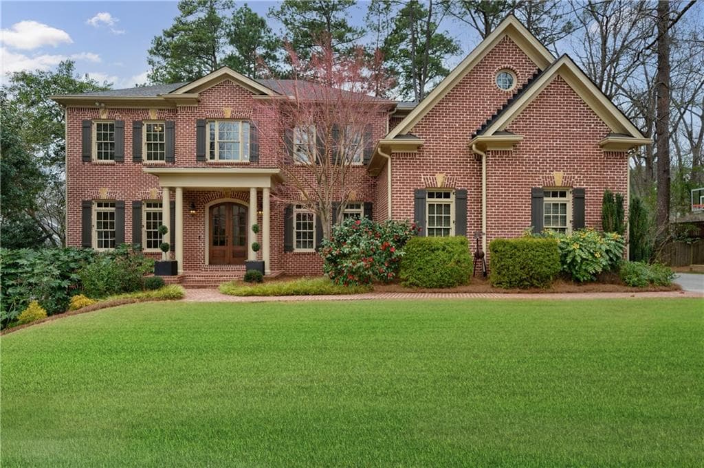 6 bedroom, 7 bathroom, 8,014 sq ft single family residence sold at 4156 Carmain Drive, Atlanta, GA 30342 — photo 1 of 1
