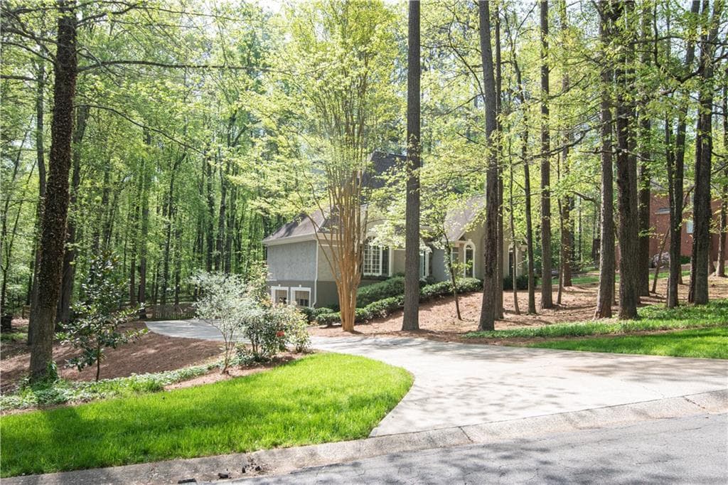 5 bedroom, 5 bathroom, 3,499 sq ft single family residence sold at 322 Lost Creek Drive, Kennesaw, GA 30152