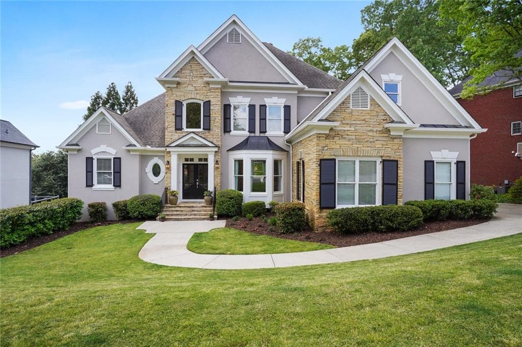 5 bedroom, 6 bathroom, 7,182 sq ft single family residence sold at 720 Clubside Drive, Roswell, GA 30076