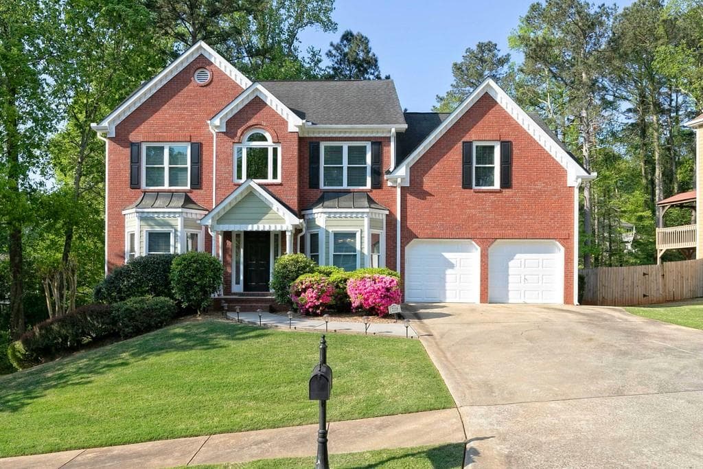 4 bedroom, 3 bathroom, 2,598 sq ft single family residence sold at 2118 Township Drive, Woodstock, GA 30189
