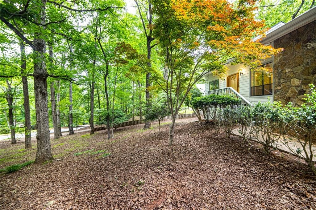 4 bedroom, 3 bathroom, 3,118 sq ft single family residence sold at 9070 MARTIN Road, Roswell, GA 30076