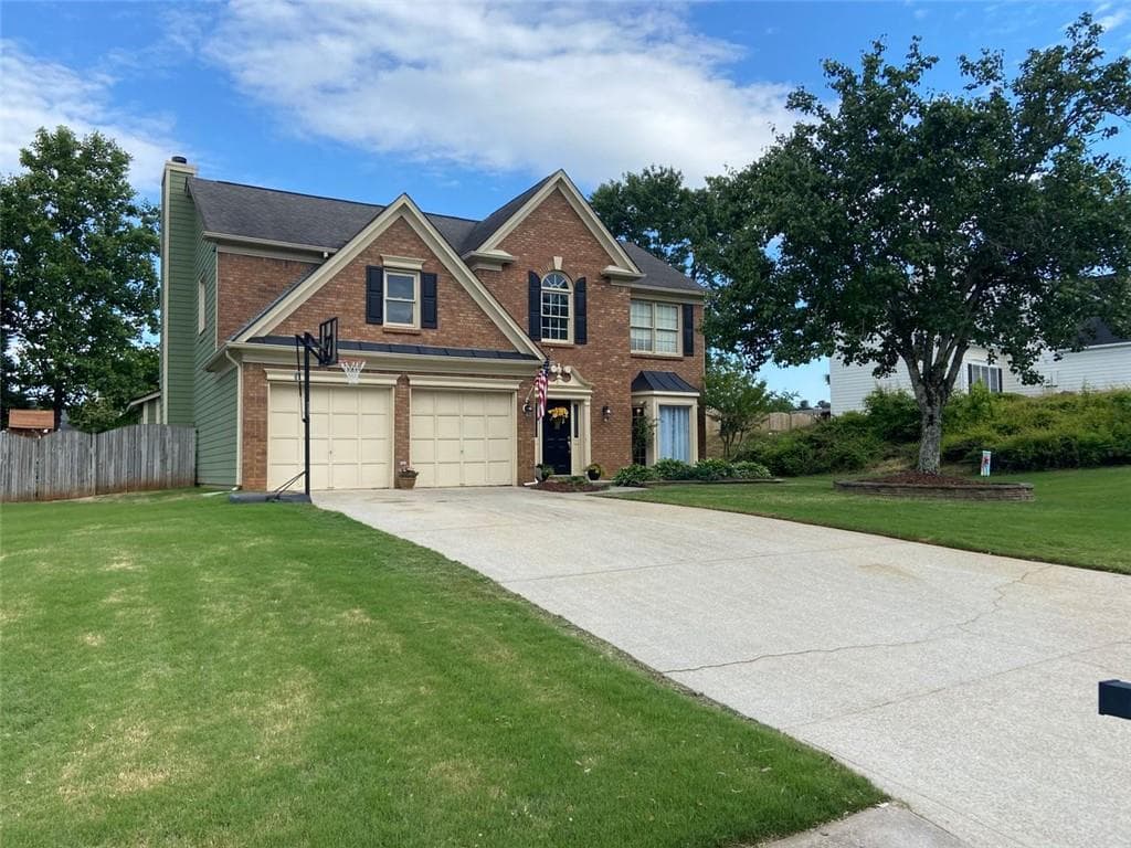4 bedroom, 3 bathroom, 2,304 sq ft single family residence sold at 7330 BROOKWOOD Way, Cumming, GA 30041