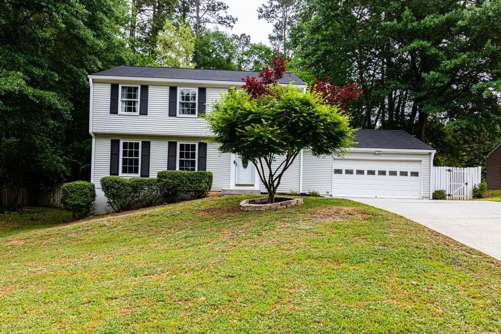 4 bedroom, 3 bathroom, 1,852 sq ft single family residence sold at 9665 N Pond Circle, Roswell, GA 30076