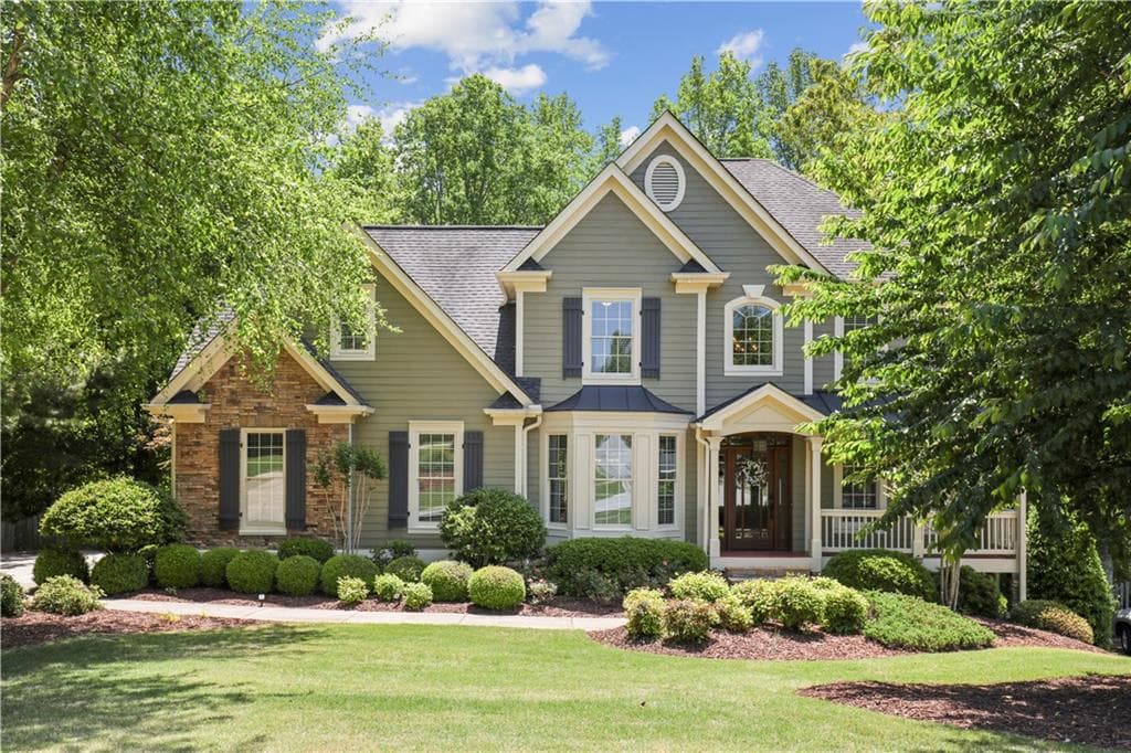 5 bedroom, 4 bathroom, 4,145 sq ft single family residence sold at 1610 Rising Mist Lane, Cumming, GA 30041