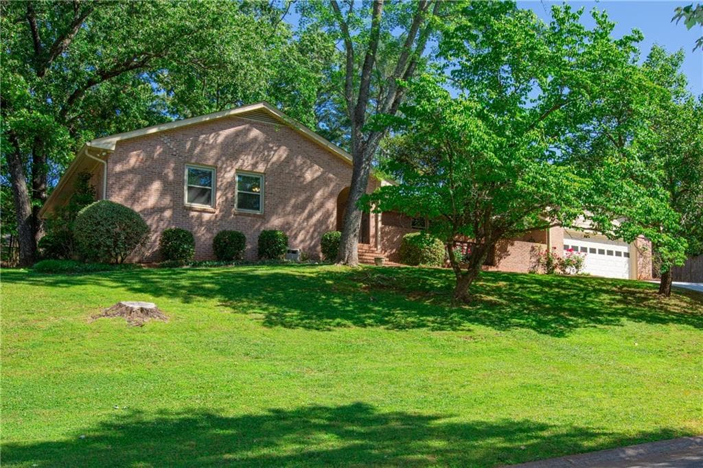 4 bedroom, 3 bathroom, 3,240 sq ft single family residence sold at 5120 Hensley Drive, Atlanta, GA 30338