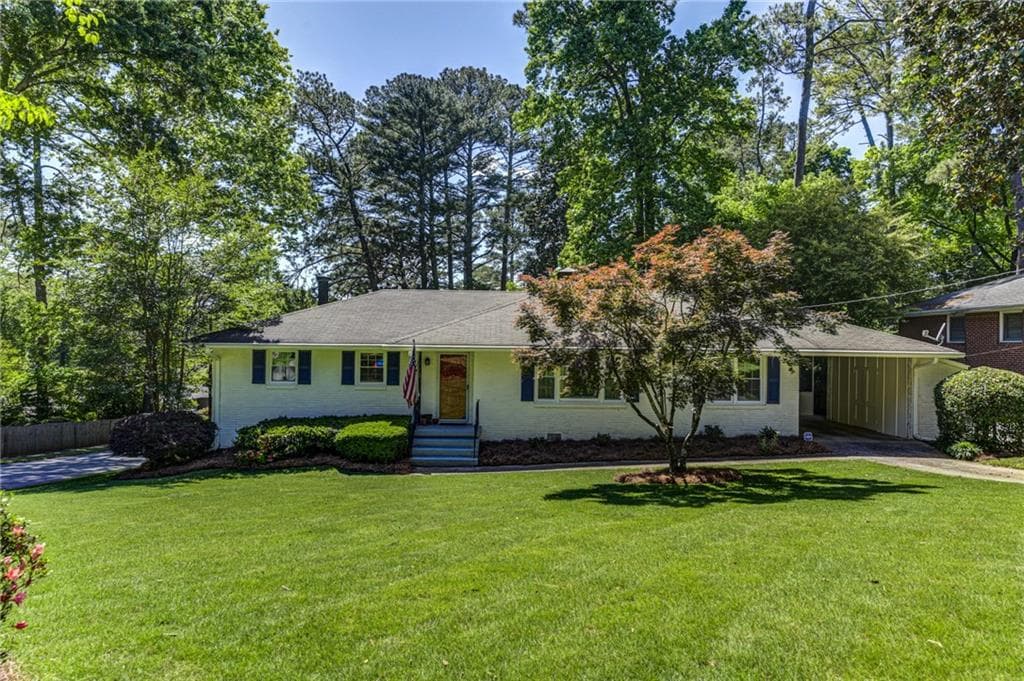 4 bedroom, 4 bathroom, 2,998 sq ft single family residence sold at 1910 Ravenwood Way, Atlanta, GA 30329