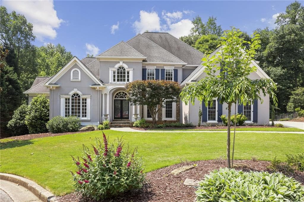 6 bedroom, 6 bathroom, 5,860 sq ft single family residence sold at 425 S Doolin Drive, Roswell, GA 30076
