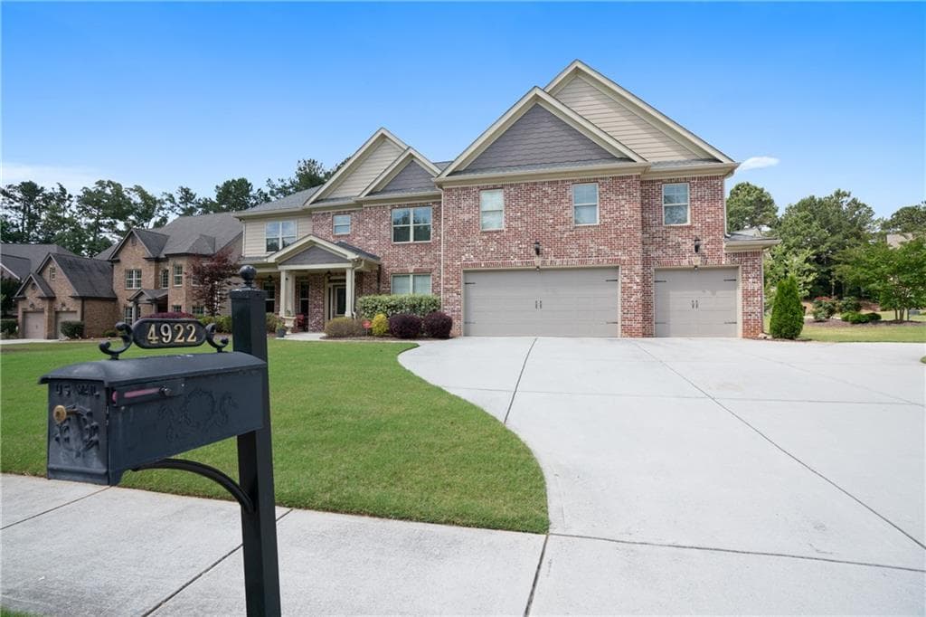 5 bedroom, 4 bathroom, 4,900 sq ft single family residence sold at 4922 Summer Wind Drive, Buford, GA 30519