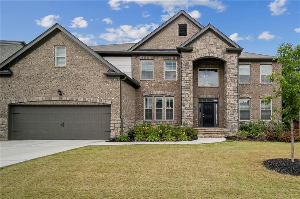 5 bedroom, 4 bathroom, 3,590 sq ft single family residence sold at 4606 Woodland Bank Boulevard, Buford, GA 30518