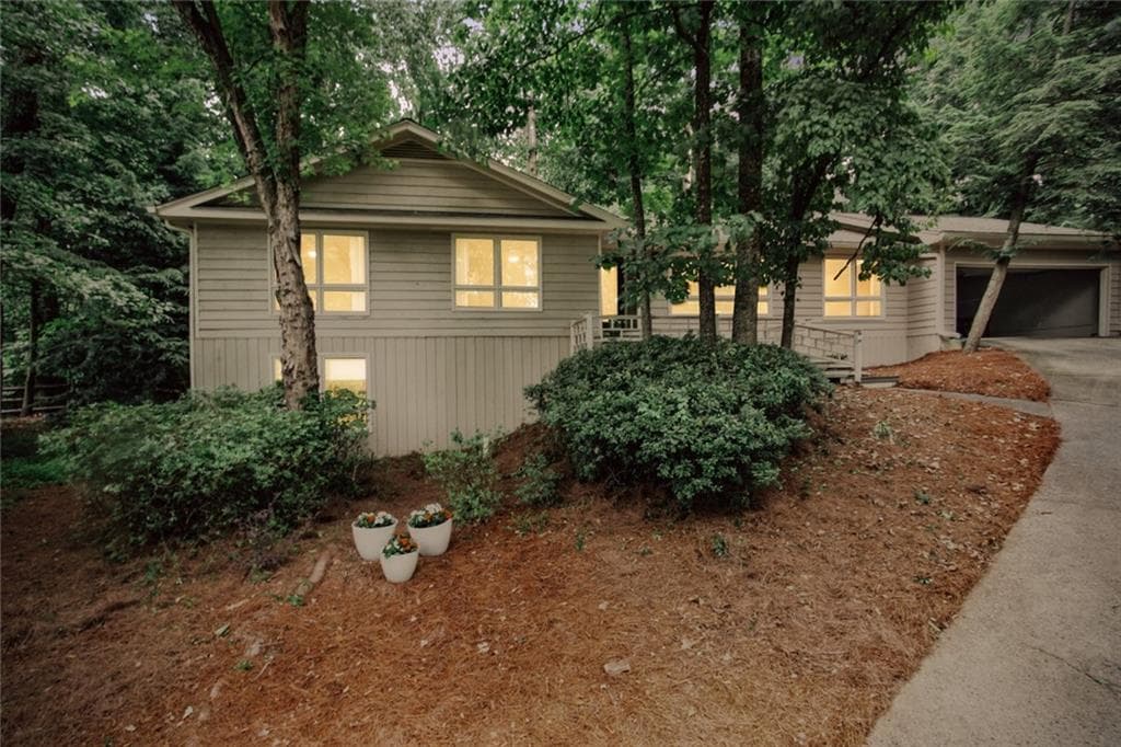 4 bedroom, 3 bathroom, 2,800 sq ft single family residence sold at 310 Clear Creek Court, Roswell, GA 30076