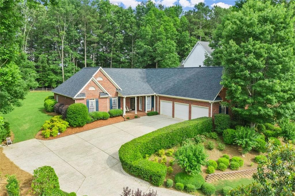 4 bedroom, 4 bathroom, 4,100 sq ft single family residence sold at 590 Fairway Drive, Woodstock, GA 30189