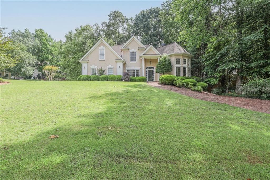 6 bedroom, 4 bathroom, 5,290 sq ft single family residence sold at 12125 Lonsdale Lane, Roswell, GA 30075