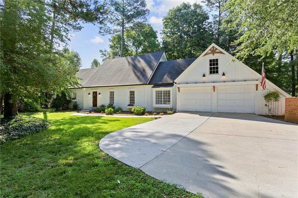 4 bedroom, 3 bathroom, 3,871 sq ft single family residence sold at 5015 Spalding Drive, Sandy Springs, GA 30350