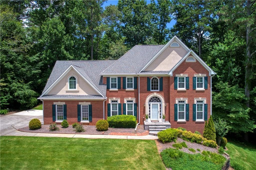 4 bedroom, 3 bathroom, 3,569 sq ft single family residence sold at 2040 Glen Gate Court, Cumming, GA 30041