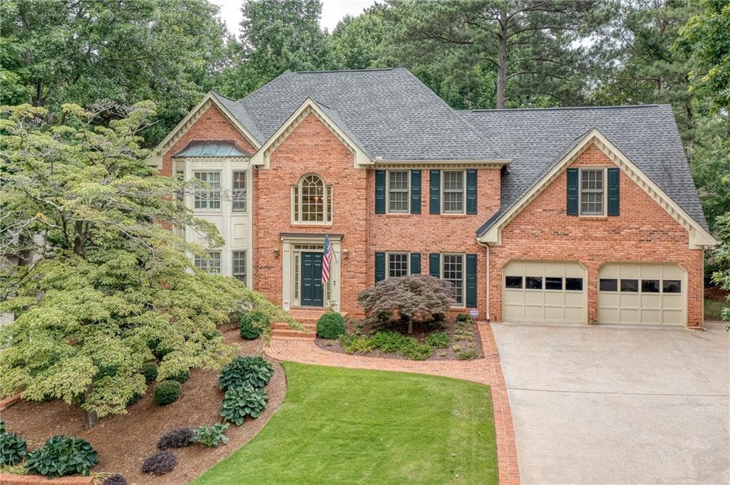 5 bedroom, 5 bathroom, 4,788 sq ft single family residence sold at 10015 Bankside Drive, Roswell, GA 30076