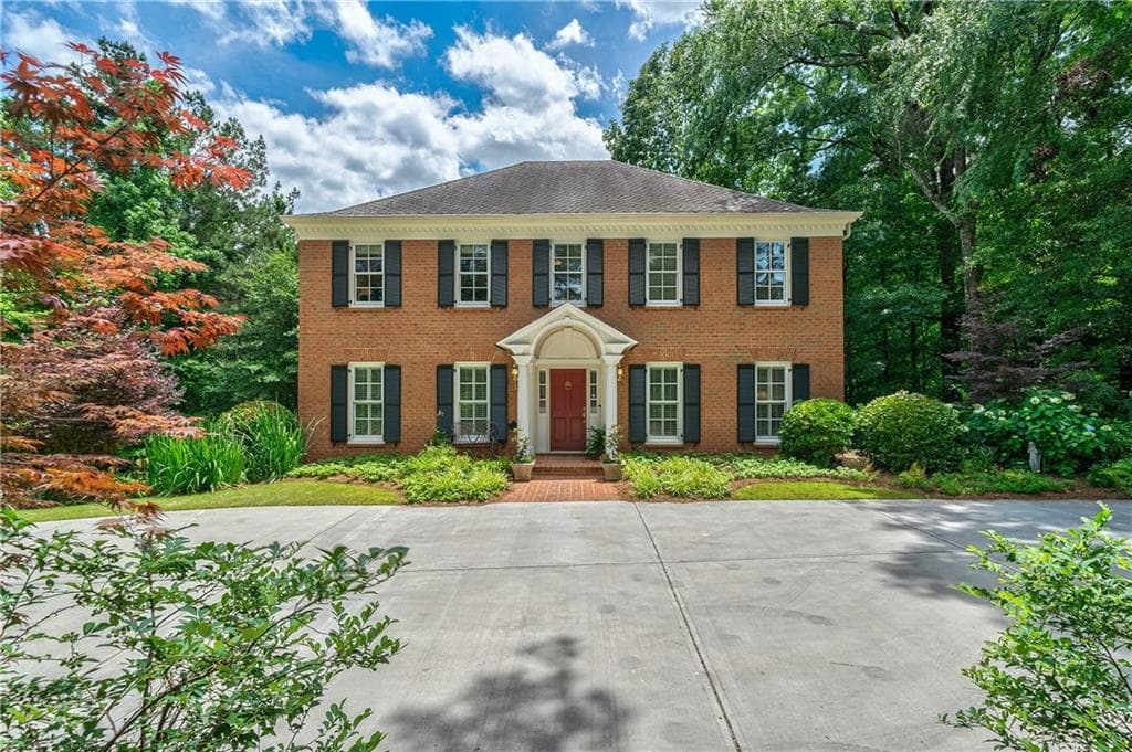 4 bedroom, 5 bathroom, 4,414 sq ft single family residence sold at 4617 Woodland Brook Drive, Atlanta, GA 30339