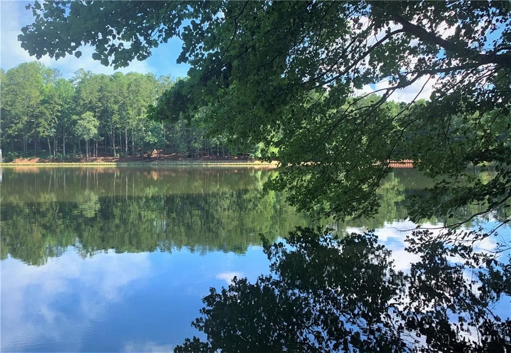 4 bedroom, 5 bathroom, 4,695 sq ft single family residence sold at 135 S Shore Court, Roswell, GA 30076