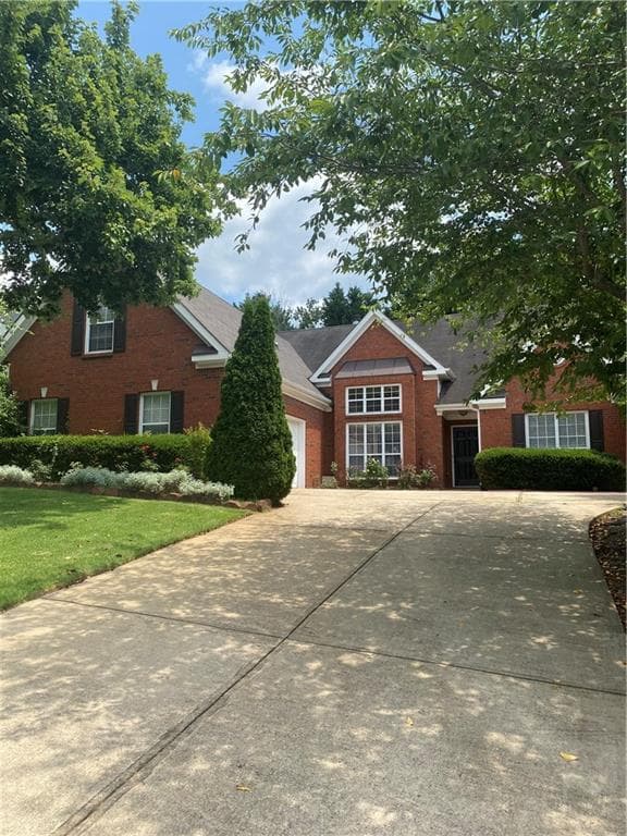 4 bedroom, 2 bathroom, 2,673 sq ft single family residence sold at 347 Canterbury Place Drive, Suwanee, GA 30024