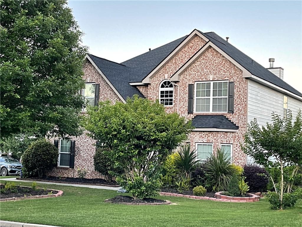 4 bedroom, 3 bathroom, 2,896 sq ft single family residence sold at 645 Rockbass Road, Suwanee, GA 30024