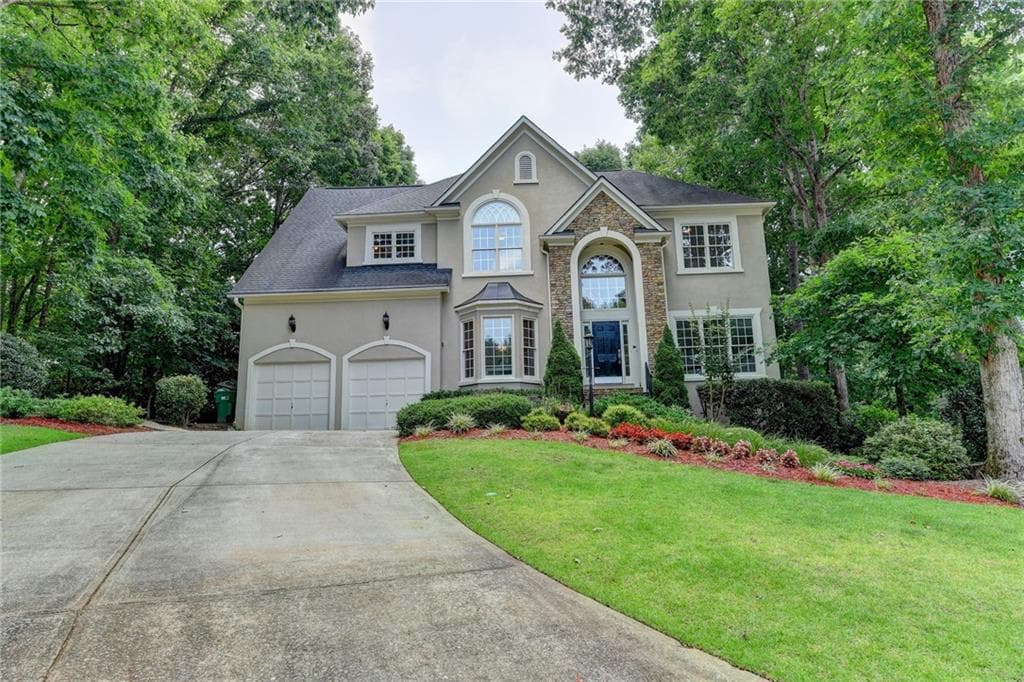 5 bedroom, 4 bathroom, 4,634 sq ft single family residence sold at 7065 Amberleigh Way, Johns Creek, GA 30097