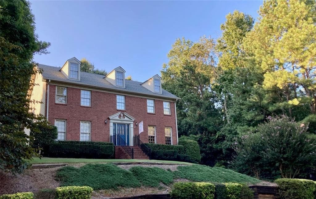 4 bedroom, 3 bathroom, 2,754 sq ft single family residence sold at 1605 Thoreau Drive, Suwanee, GA 30024