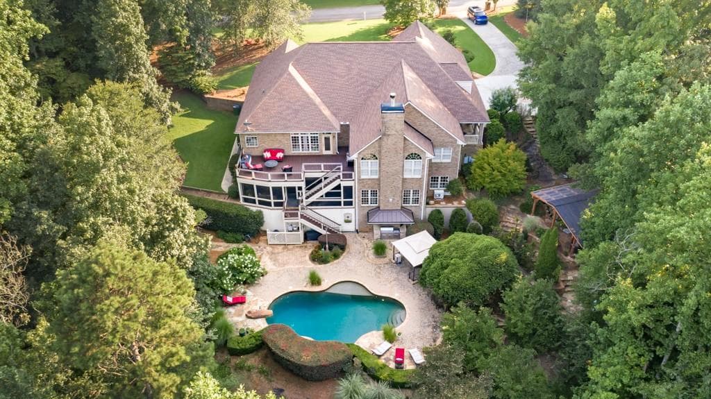 5 bedroom, 5 bathroom, 6,205 sq ft single family residence sold at 715 Antrim Glen Road, Hoschton, GA 30548