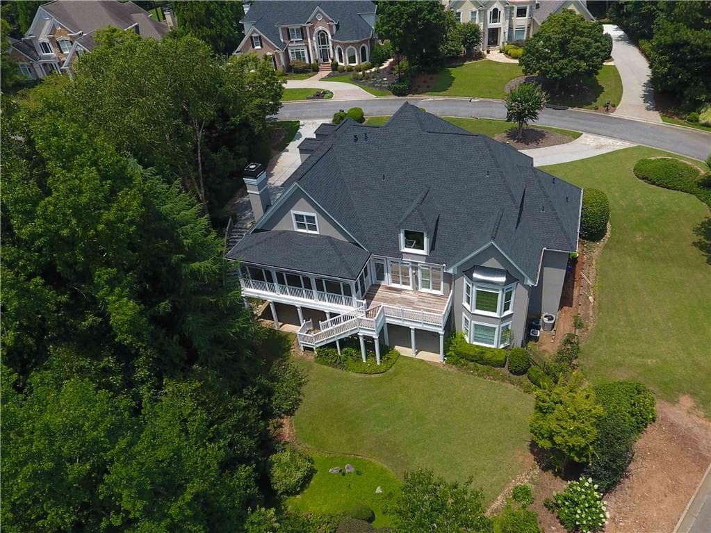 6 bedroom, 5 bathroom, 6,435 sq ft single family residence sold at 700 Winnmark Court, Roswell, GA 30076
