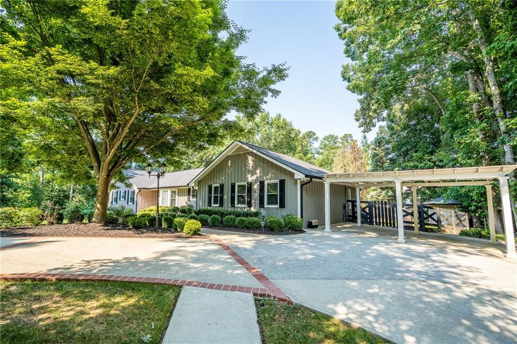4 bedroom, 4 bathroom, 4,300 sq ft single family residence sold at 1855 Cox Road, Roswell, GA 30075