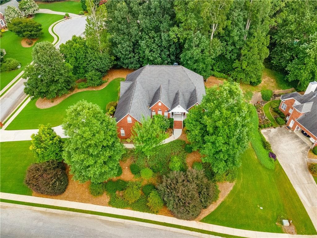 5 bedroom, 4 bathroom, 5,988 sq ft single family residence sold at 2101 Hickory Circle, Loganville, GA 30052