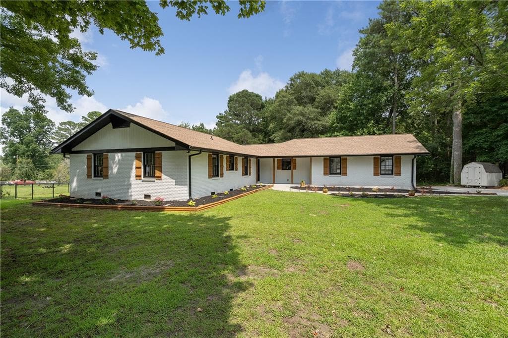 4 bedroom, 2 bathroom, 1,842 sq ft single family residence sold at 2848 Rosebud Road, Loganville, GA 30052