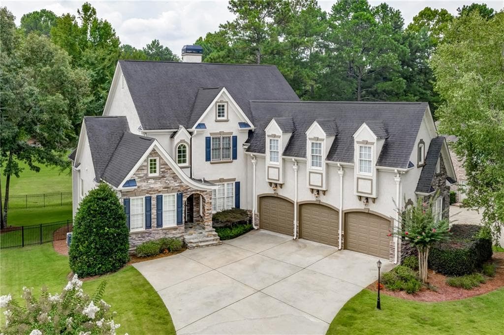 6 bedroom, 7 bathroom, 7,053 sq ft single family residence sold at 1404 Bridgemill Avenue, Canton, GA 30114