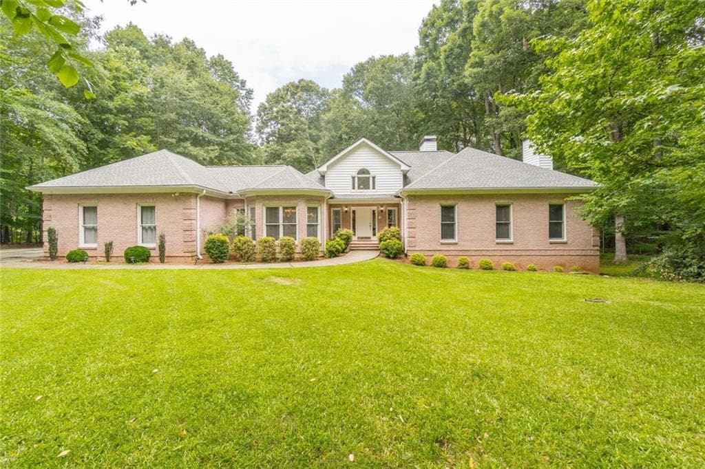 4 bedroom, 4 bathroom, 4,466 sq ft single family residence sold at 5025 Meadowbrook Circle, Suwanee, GA 30024 — photo 1 of 1