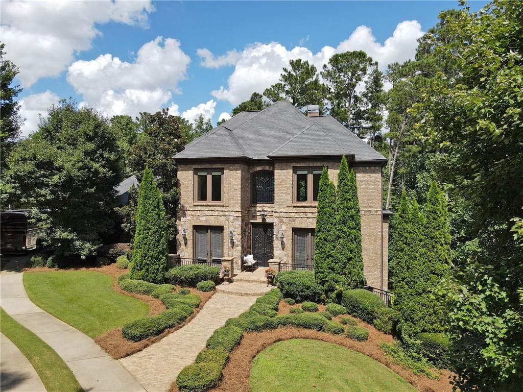 5 bedroom, 6 bathroom, 6,512 sq ft single family residence sold at 1605 Lockridge Drive, Cumming, GA 30041